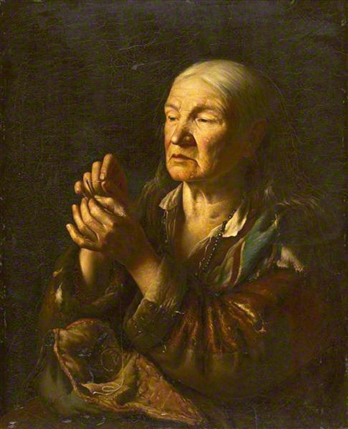 grandmother threading a needle